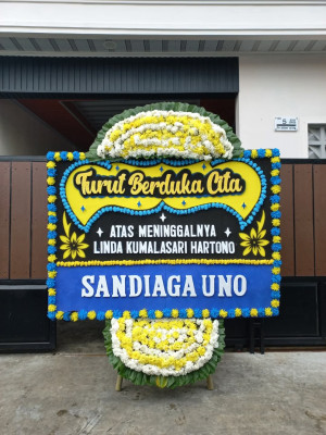 Papan Bunga Duka di Pusat Pasar